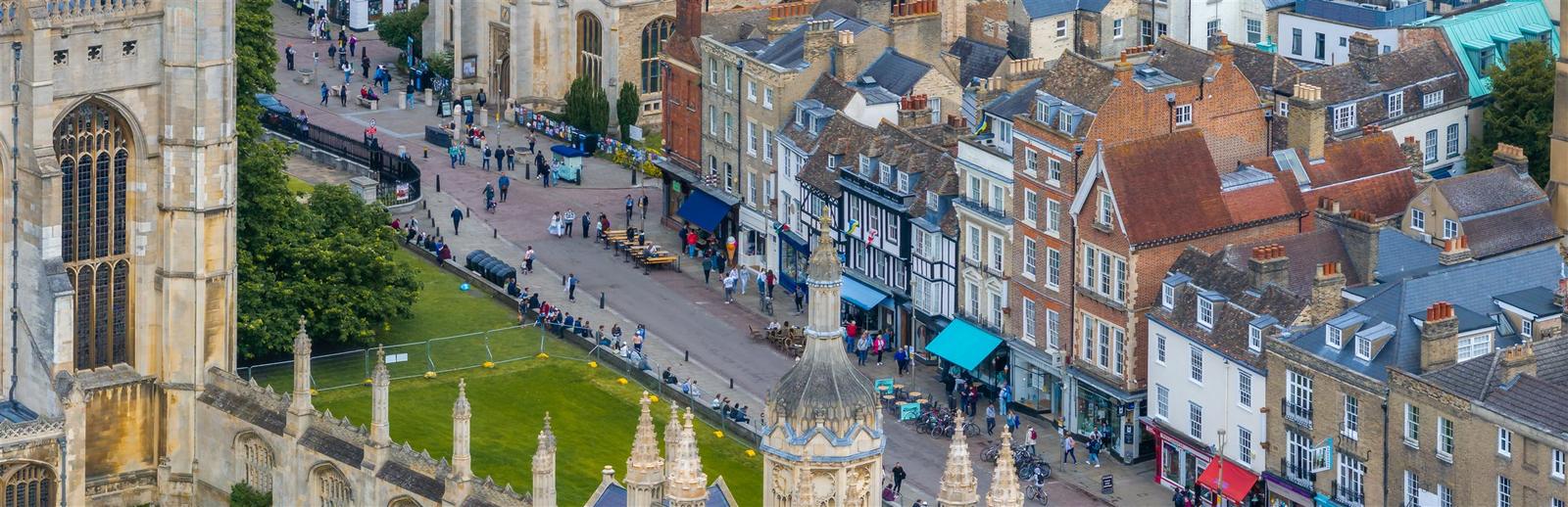 Illustration of a UK high street of local businesses