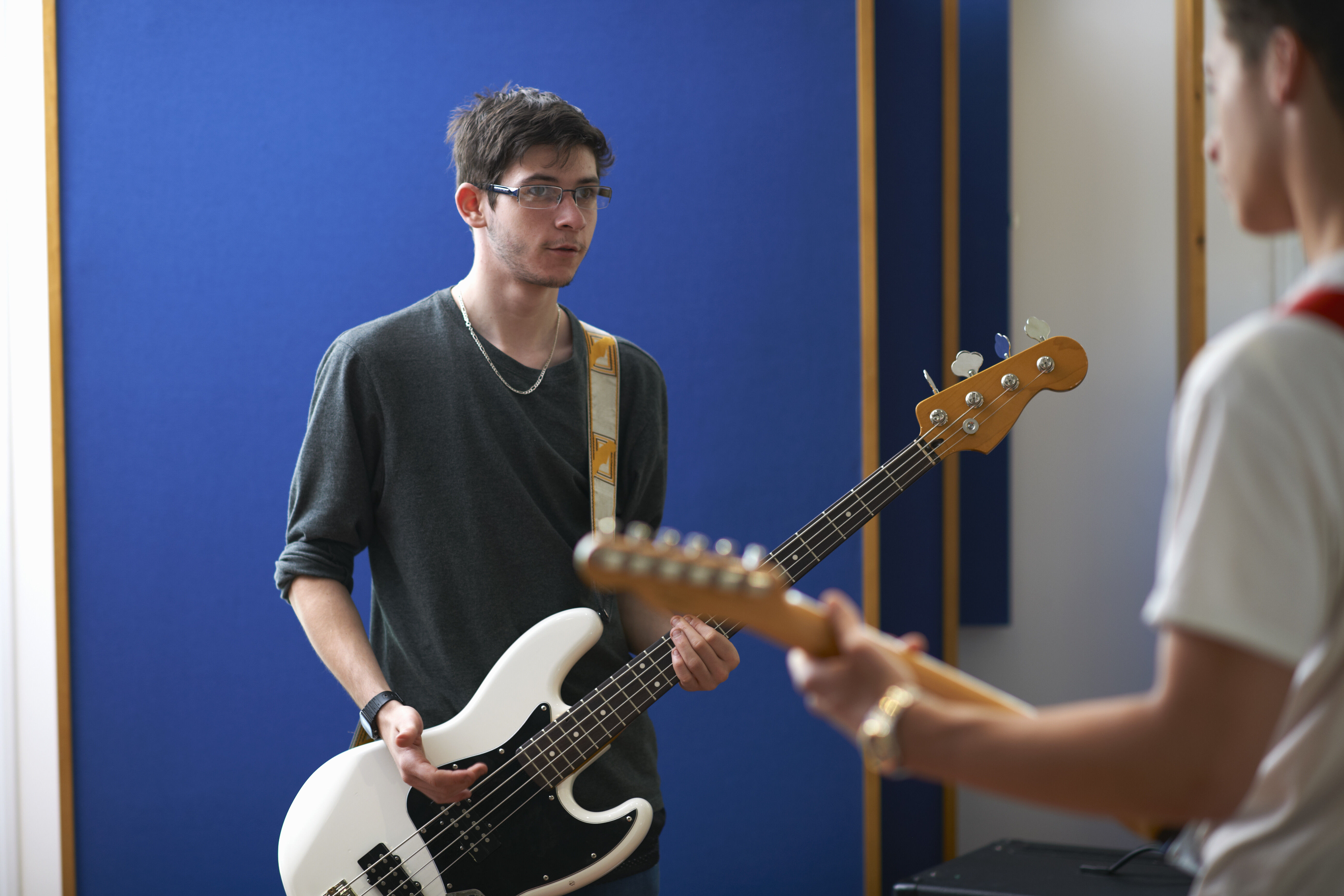 young male college students playing guitars in rec 2026 01 09 10 34 13 utc 1